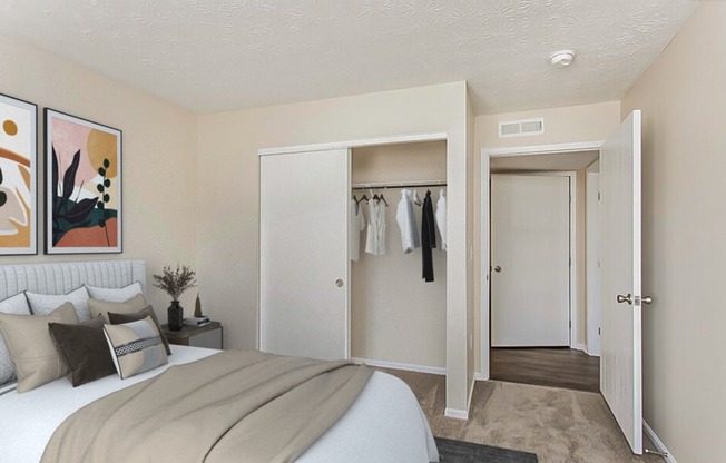 Bedroom facing closet and door