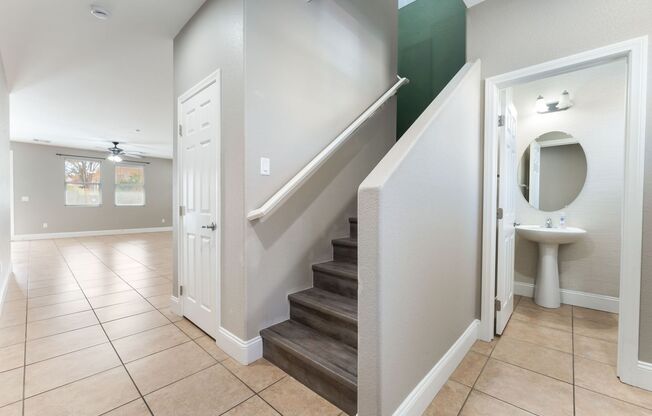 Welcome to this spacious 4-bedroom, 2.5-bathroom home at Sunrise Highlands Community!
