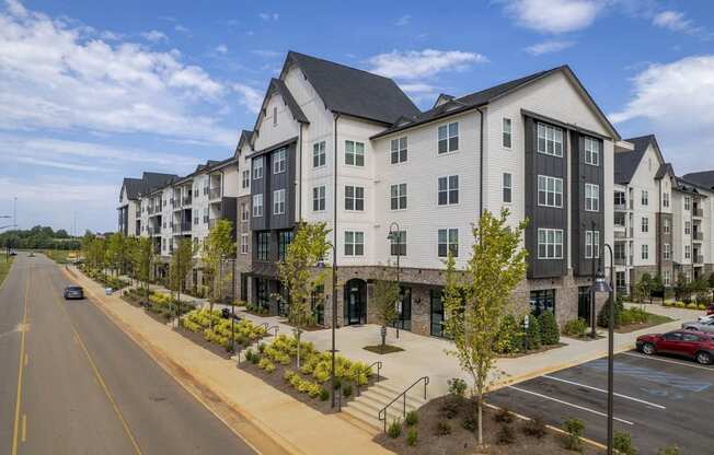 an apartment building on the side of a street
