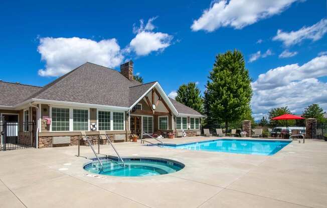 Country Vista at Liberty Lake with swimming pool with the clubhouse in the background