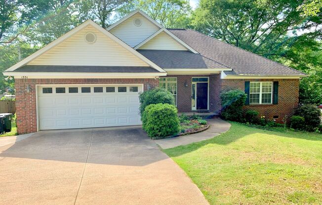 One Level 4 Bedroom Brick Home on N. College St