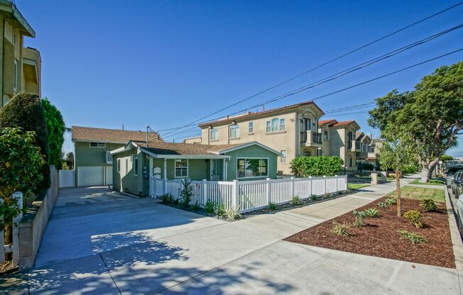 NEWLY REMODELED, SPLIT-LEVEL 3BR2BA DUPLEX W/ OCEAN VIEW, SPACIOUS YARD/PATIO & LARGE 2-CAR GARAGE ON QUIET STREET JUST BLOCKS TO SCHOOLS, PARK, SHOPPING & BEACH!