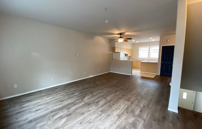 Fantastic Townhome with Gas Fireplace, Deck, Fenced Yard, and Vaulted Ceilings