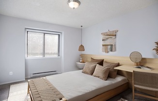 Bedroom with a bed and a desk at Governor's Park, Fort Collins, 80525