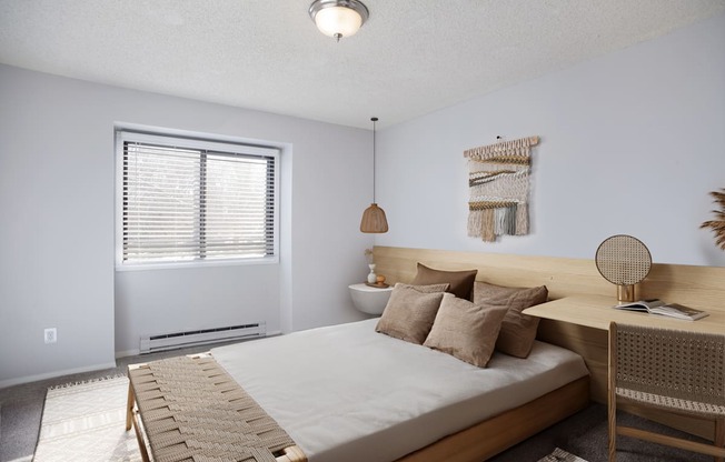 Bedroom with a bed and a desk at Governor's Park, Fort Collins, 80525