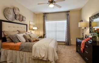 Guest Bedroom that easily fits queen size bed featuring large windows at Ashley Auburn Point in Atlanta, GA