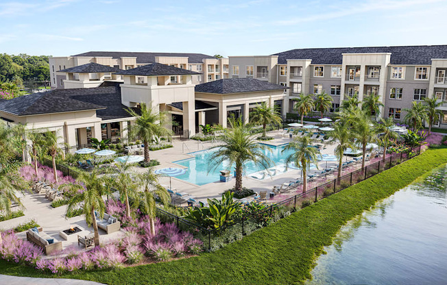 an aerial view of the pool at the resort at longboat key club