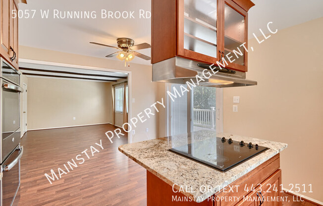 5057 W RUNNING BRK RD