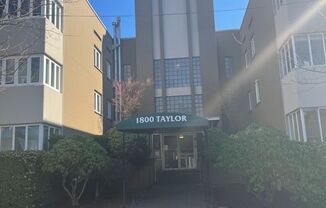 Cute and Cozy East Queen Anne Condo with 2 Bedrooms, 1 Bath and 1 Covered Parking Space