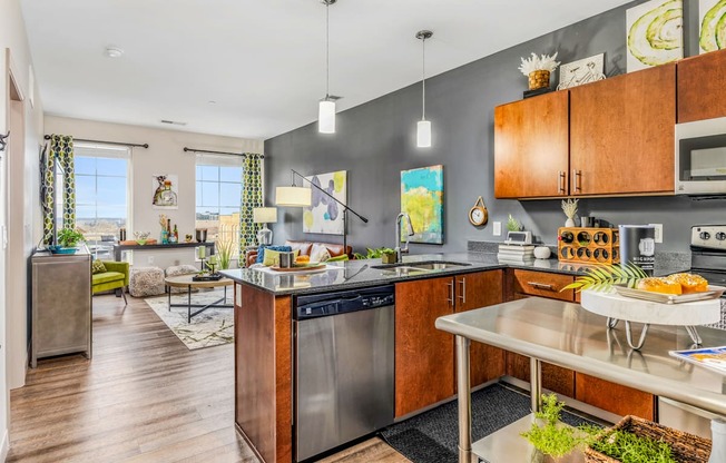 a kitchen with stainless steel appliances and a counter top
