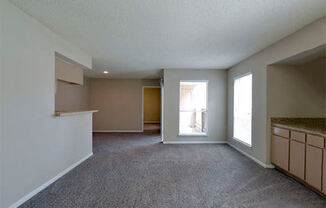 Model home living room with door to balcony