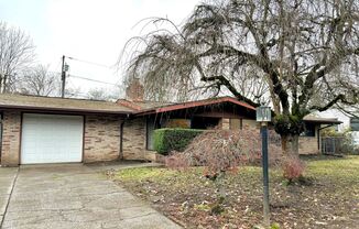 Hazelwood/Mill Park Fully Renovated Ranch Home with Attached Garage, New LVP flooring Throughout, Huge Yard