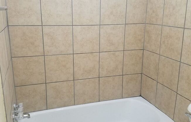 2 Bedroom, 1.5 Bathroom 1st Floor Condo with Central Heat and Air and Stainless Steel Appliances