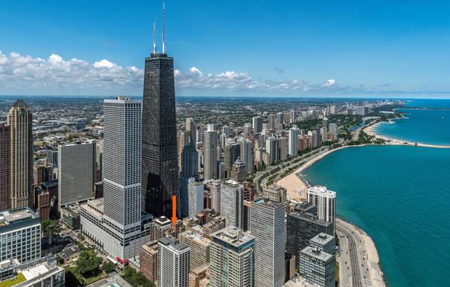 a view of the chicago skyline and lake michigan