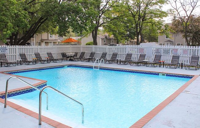 outdoor swimming pool at apartment community