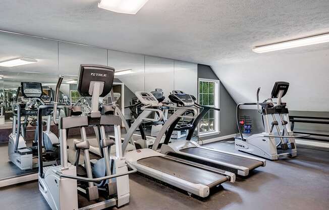 Fitness Center with Large Floor to Ceiling Mirrors