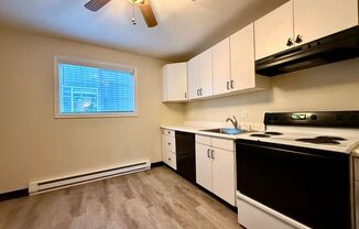 ~Don't Miss Out! Amazing Sunnyside Location~ Main Floor Unit, Updated Throughout~ Washer/ Dryer~ 90 Walk Score, 98 Bike Score~ Off Street parking~