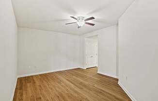 bedroom with wood floors