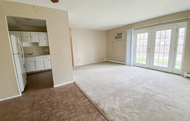 2 Bed Apartment - Dining, Kitchen, & Living Room