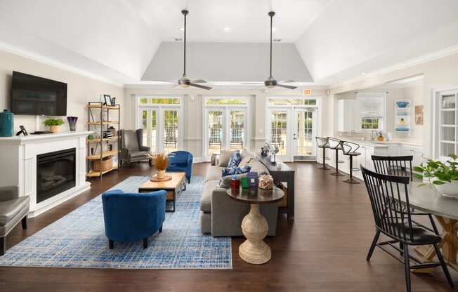 a living room filled with furniture and a fire place