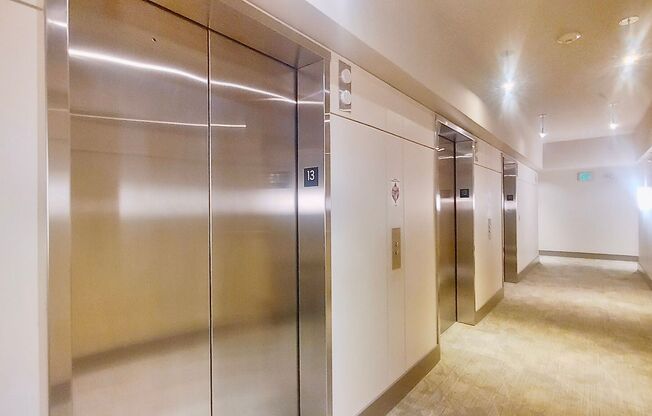 **HOLIDAY SPECIAL OWNER WILL PAY MOVE IN/OUT FEE** Panoramic Views of the Hills and the City are yours in this 13th Floor 1 Bedroom Plus Office Condo in The John Ross.