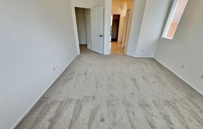 SPACIOUS 3 BEDROOM, 3 BATH RENTAL HOME IN SOUTHSTAR AT THE RIDGES TWO-STORY RESIDENCE FEATURING A FIRST-FLOOR GUEST SUITE WITH FULL BATH—PERFECT FOR VISITORS OR HOME OFFICE
