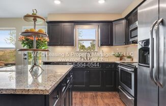 Serrano Townhomes  with walk out finished basement and full bath, minutes from Downtown KC
