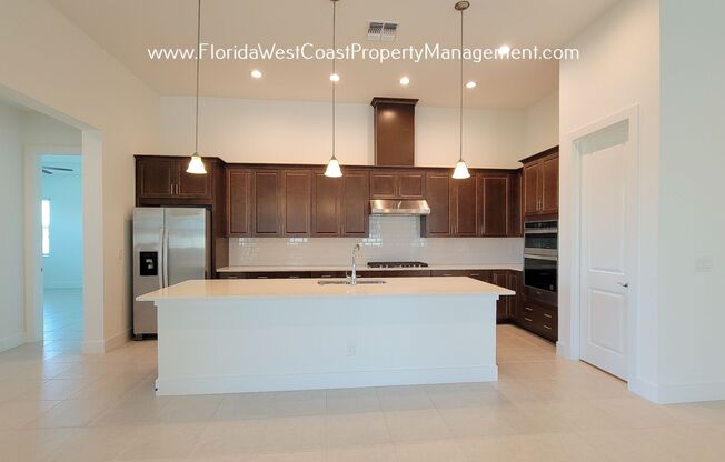 IMPRESSIVE TOLL BROTHERS HOME! SUPERIOR FINISHES with SUPERIOR AMENITIES!  ISLES AT LAKEWOOD RANCH!