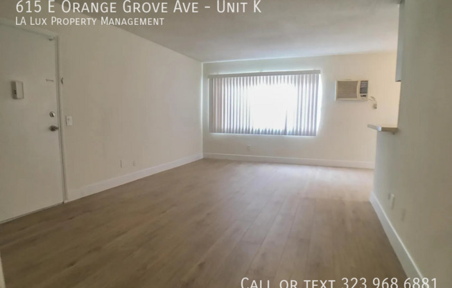 615 E ORANGE GRV AVE