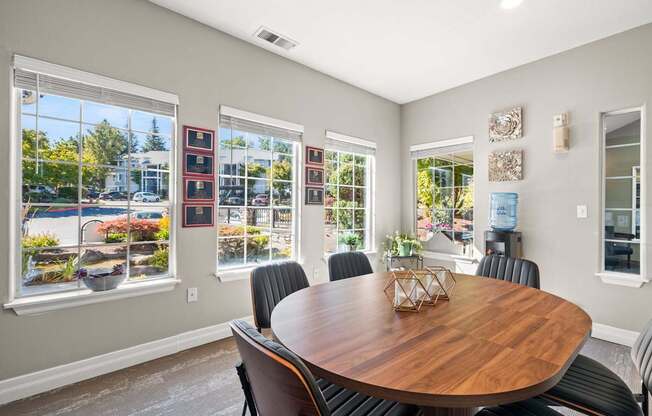 A conference room with a wooden table and chairs at Clackamas Trails Apartments, Oregon, 97222