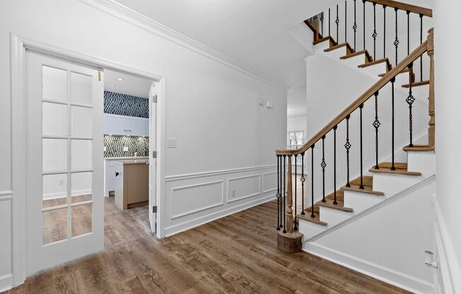 Rare Luxury 3-Story Townhome in Walton School District – Dual Kitchens, Double Decks & More!