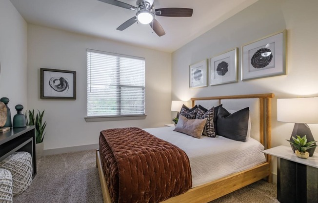 luxury bedroom with ceiling fan at Berkshire Medical District apartments