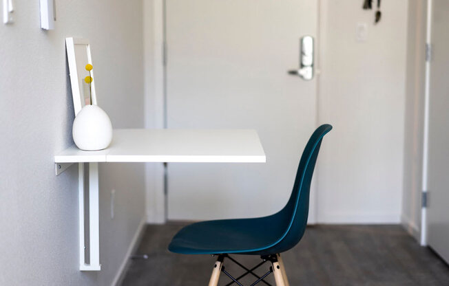 a desk and a chair in a room