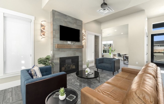 a living room with a fireplace and couches