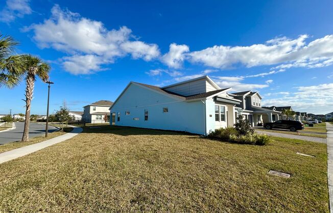 Stunning 3/2 Modern Home with a Covered Patio and a 2 Car Garage in the Summerdale Park at Lake Nona - Orlando!