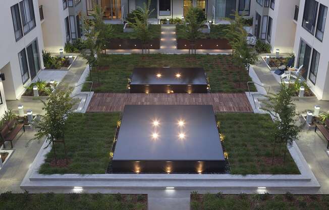 Inner courtyard with a water feature and sitting area.