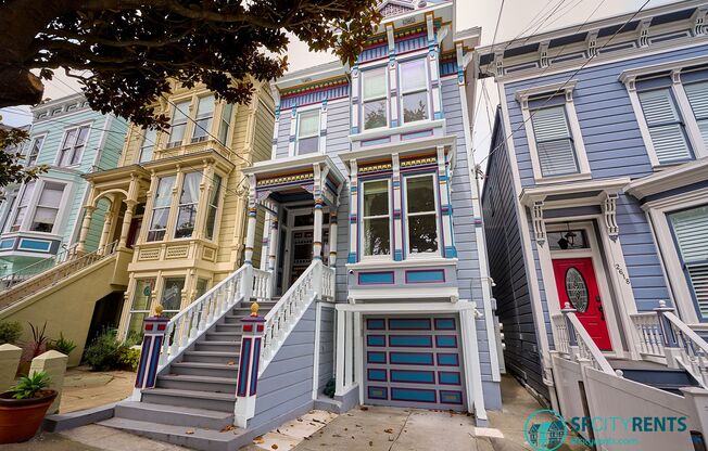 Lower Pacific Heights: Victorian Condo w/ Double Parlor, Shared Yard & EV-Ready Garage Parking