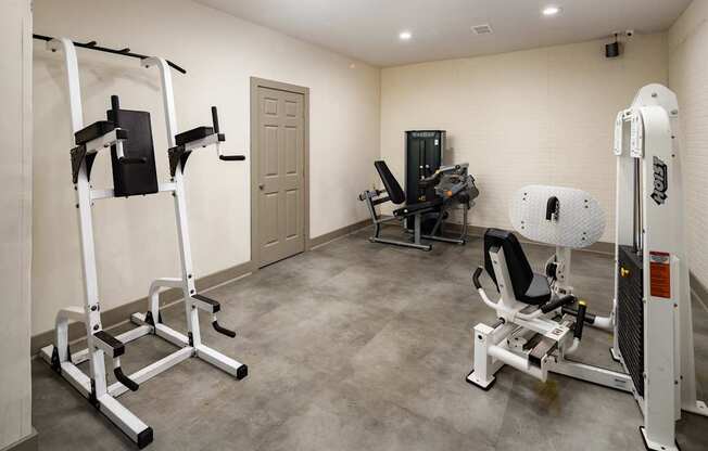 A gym with a variety of equipment