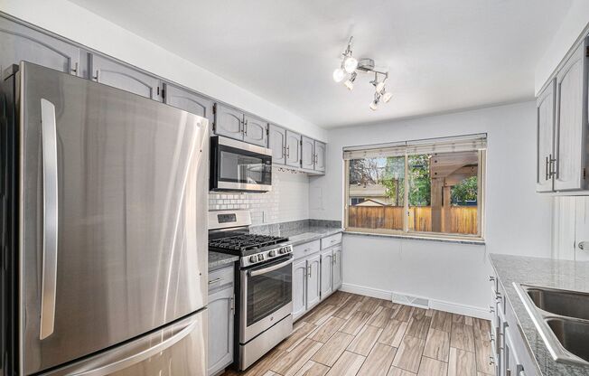 Updated Five-Bedroom Brick Ranch in the Heart of Littleton