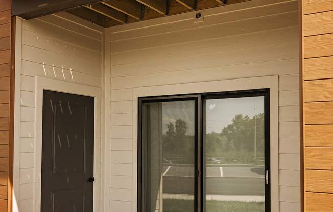 Patio with sliding glass door and extra storage at 44 West Luxury Living, Valley Park, MO, 63088