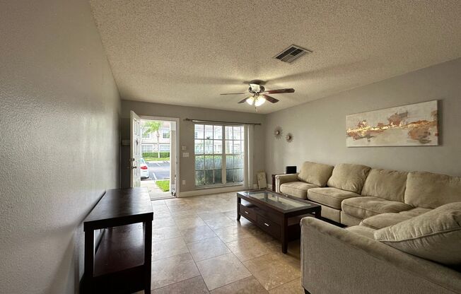 Beautiful Townhome in a gated community with assigned parking spots and a community pool