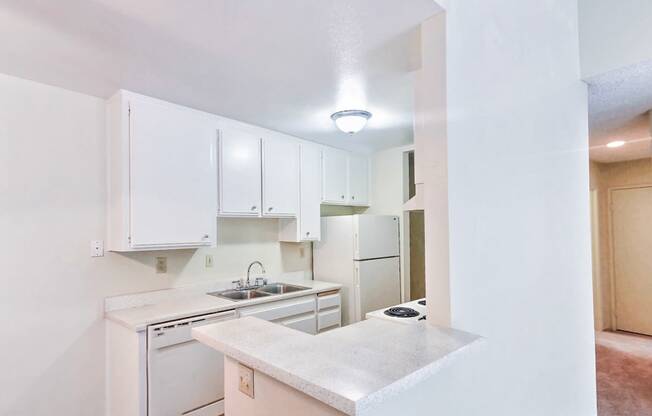 Village Park Apartments White Kitchen in Encinitas CA Now Leasing