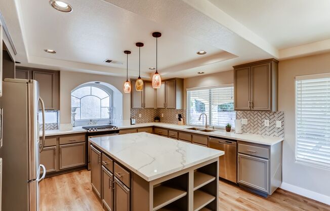 Modern 5-Bedroom, 3-Bathroom Oasis with a 3-Car Garage in the Heart of Las Vegas