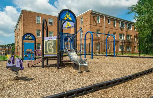 playground with jungle gym at jetu apartments in washington dc