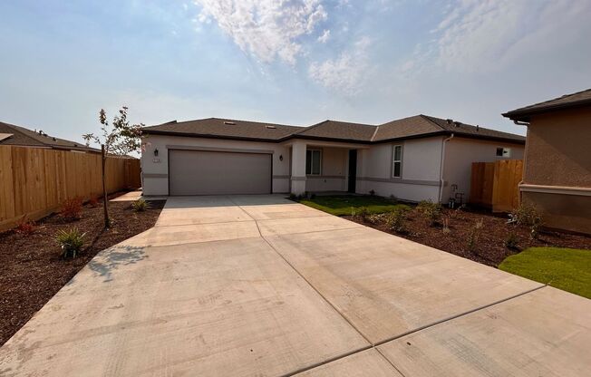 Brand new home located between Tulare and Visalia