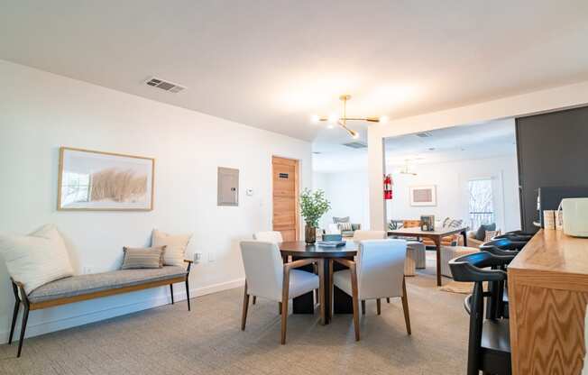 an open living room and dining room with a table and chairs and a living room