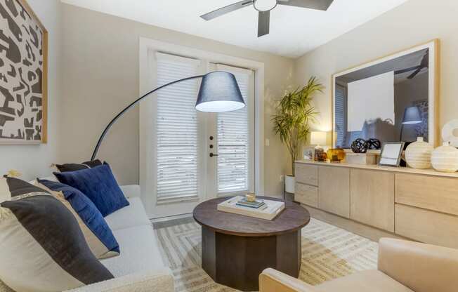 a living room with a couch and a coffee table