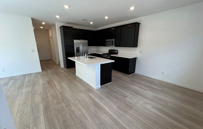 Modern 4 Bed, 3 Bath Townhome with Updated Features