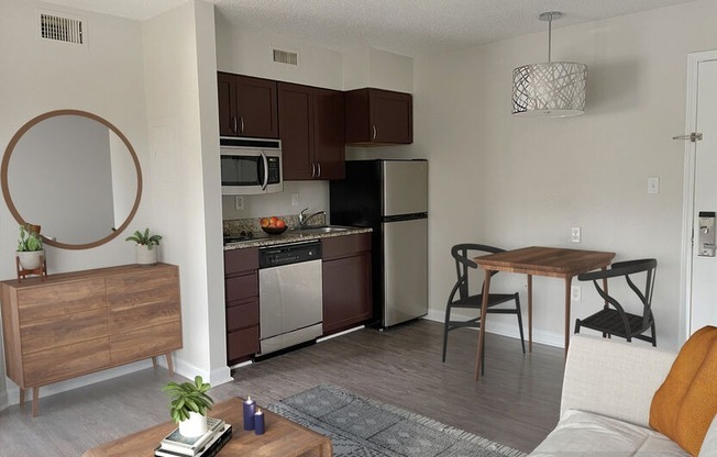 kitchen with stainless steel appliances and wood style floors