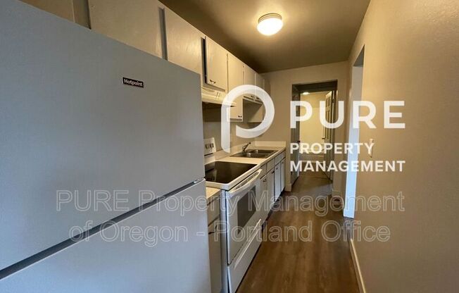 18411 E. Burnside St.